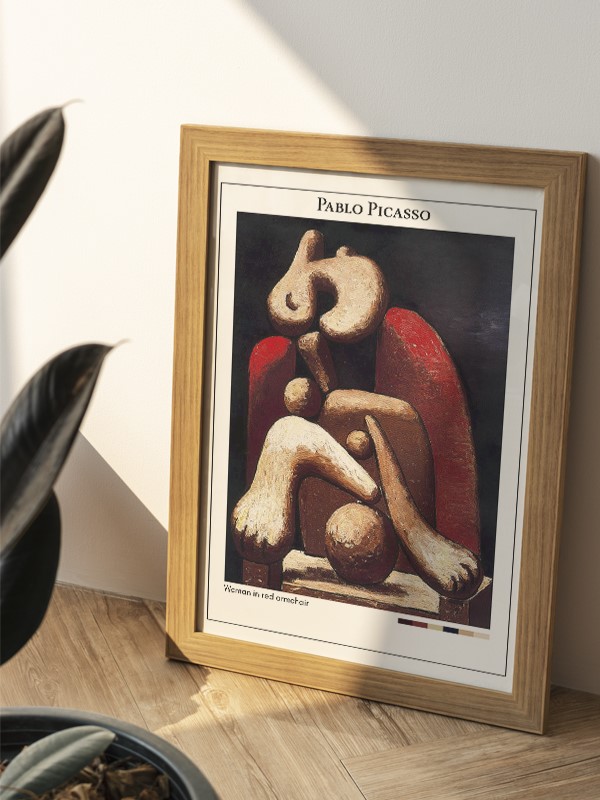 Pablo Picasso Woman in red armchair Poster