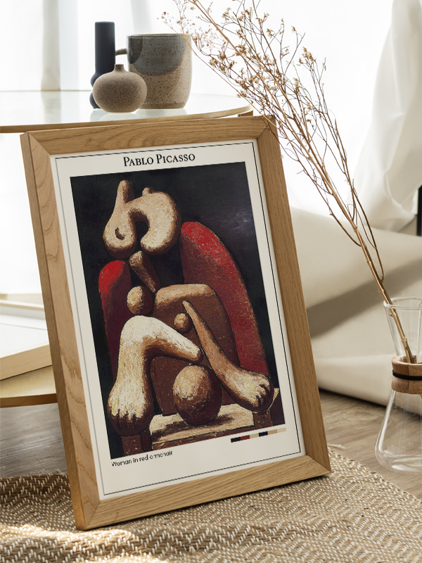 Pablo Picasso Woman in red armchair Poster