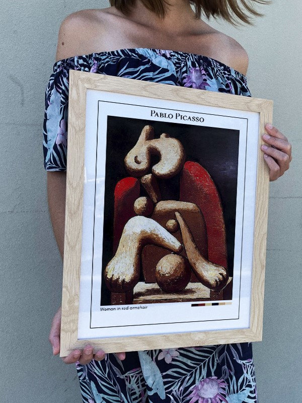 Pablo Picasso Woman in red armchair Poster